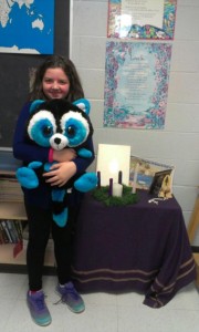Photo Submitted Monsignor Ronan winner – Mia G. winning Blueberry the stuffed raccoon